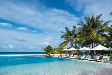 Fototapeta na wymiar Perfect tropical island paradise beach and pool