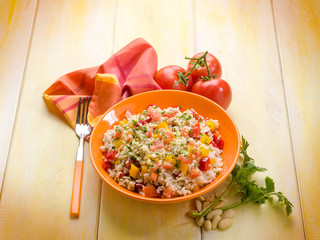 rice salad with tomatoes capsicum and almond
