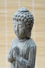 Foto auf Acrylglas Stenen  grijze Boeddha © trinetuzun