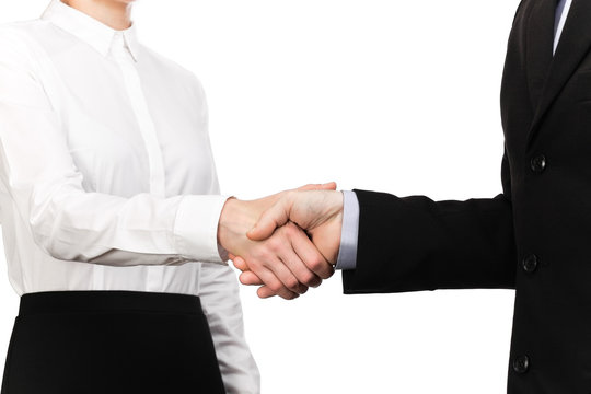 Photograph of a handshake between a waitress and a businessman