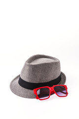 Hat , sunglasses isolated on white
