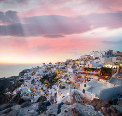 Mediterranean village of Oia at dusk, Santorini Island - Greece