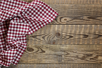 Empty wooden table with tablecloth
