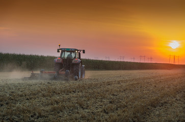 Fototapeta premium tractor plowing