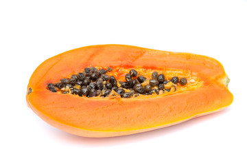 Half of papaya fruit isolated on white with clipping path