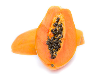 Half of papaya fruit isolated on white with clipping path