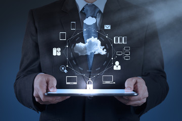 Businessman working with a Cloud Computing diagram on the new co