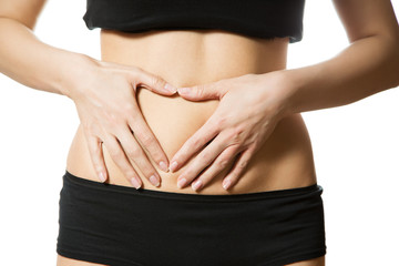 Fototapeta premium Hand on the tummy