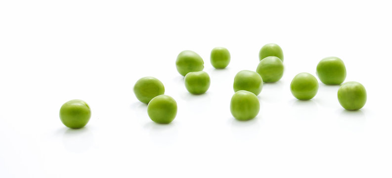 Scattered green peas closeup