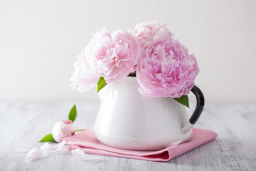 beautiful pink peony flowers bouquet in vase © Olga Miltsova