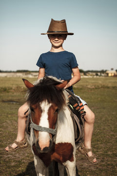 Little kid with pony