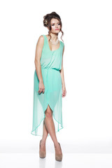 beautiful girl in a turquoise dress