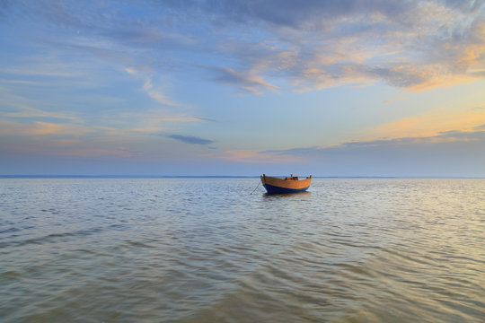Lonely boat moored in the bay