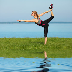 Fototapeta premium beautiful girl doing yoga