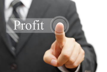 Businessman pressing  profit word on virtual button