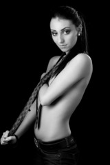Beautiful half-naked brunette eagerly looks