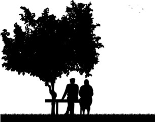 Very old couple sitting on bench in park silhouette