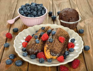 Eclairs with berries