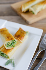 Pancakes with spinach and ricotta cheese