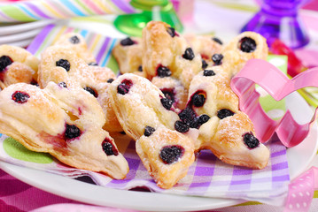 butterfly shaped puff pastry cookies with blueberry