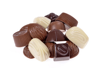 Many different chocolate candy isolated on white background