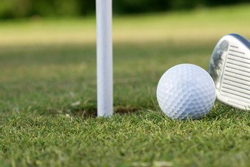 Golf ball on green course