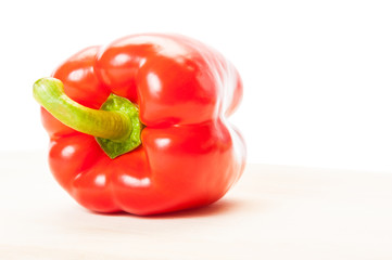 Closeup with one big red pepper.