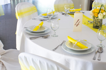 yellow and white wedding table decoration