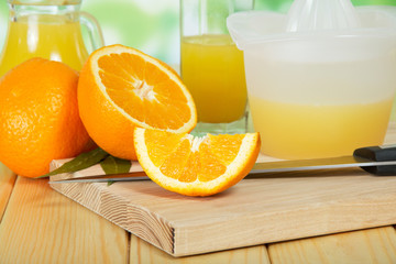 Orange slices cutting board, juicer, knife