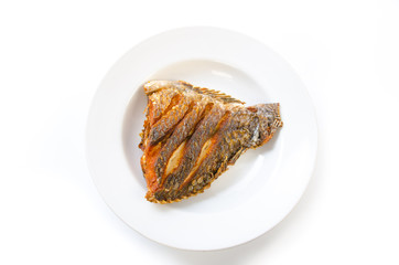 fried fish in plate white background isolated