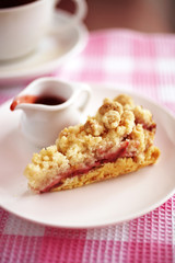 close up strawberry cheese cake in white dish