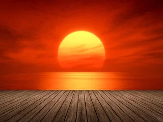 Tuinposter Zonsondergang aan zee rode zonsondergang