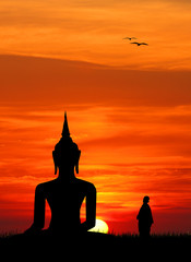 Buddha statue at sunset