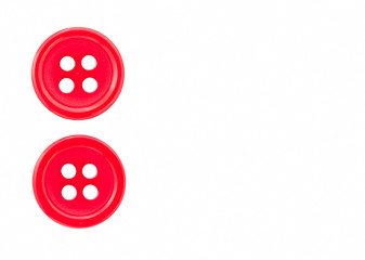 Two red buttons on a white background