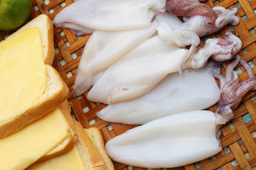 Fresh squid in a basket - for cooking.