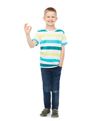 Fototapeta premium little boy in casual clothes showing OK gesture