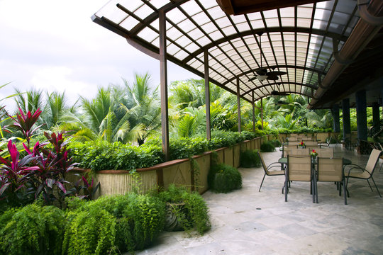 Restaurant on a open verandah in a modern luxury hotel
