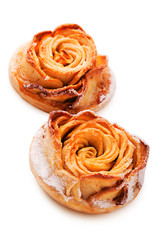 Cake in the shape of a rose isolated on white