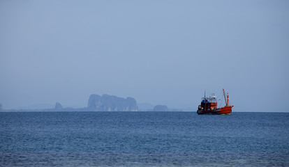 Fishing boat on the sea of Thailand. © plpchirawong