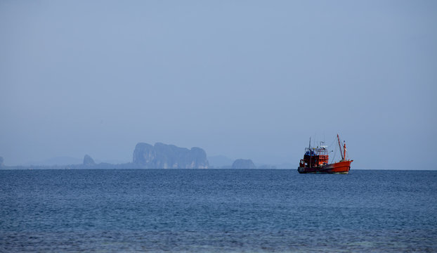 Fototapeta Fishing boat on the sea of Thailand.