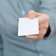 blank business card in female hand