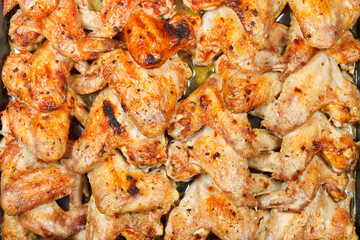 top view of many roasted spicy chicken wings