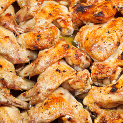 lot of baked spicy chicken wings