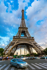 Car in front of Eiffel Tower, Paris, France