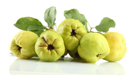 sweet quinces with leaves, isolated on white