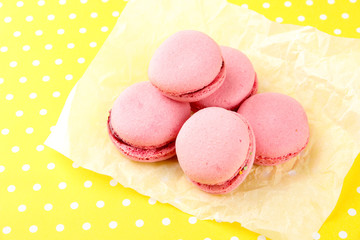 Gentle macaroons on table close-up