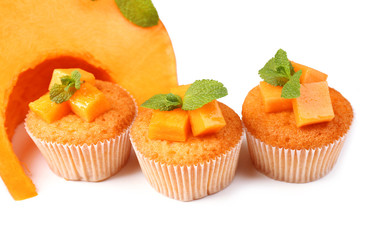Tasty pumpkin muffins, isolated on white