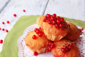 Tasty muffin with red currant berries