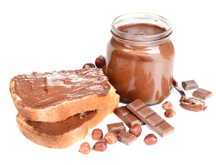 Sweet chocolate cream in jar isolated on white