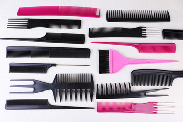 Professional hairdresser tools  on color wooden background